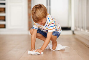 Kids cleaning floor | Degraaf Interiors